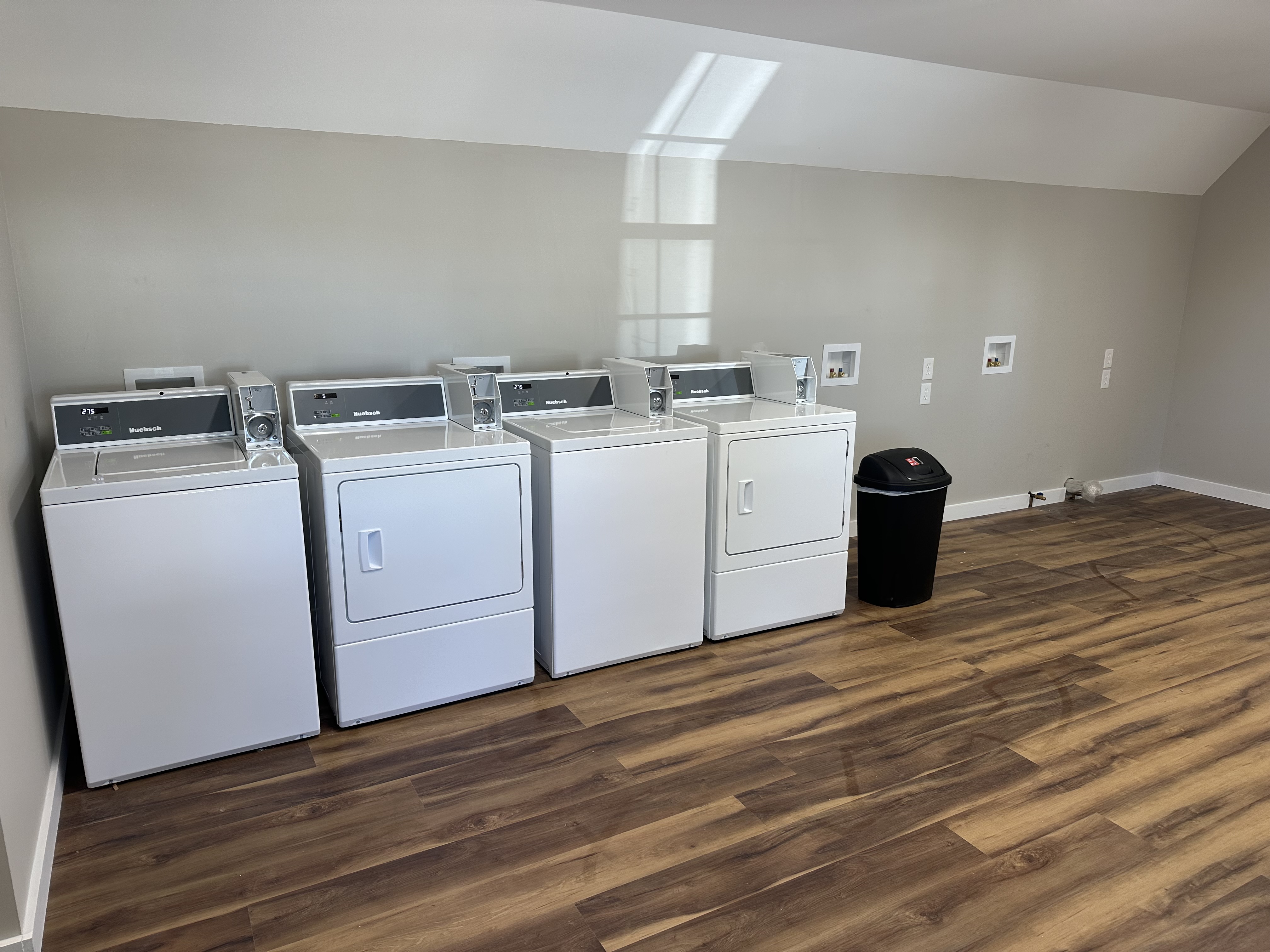 washer and dryer in laundromat